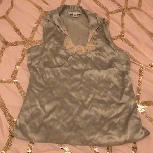 Silk light blue sleeveless blouse